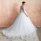 Wonderful Long A-line Appliques Tulle Wedding Dress with Sleeves